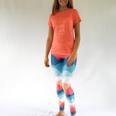 One Plane Jane signature cloud leggings. Fun blue, orange and coral design with an airplane on the back side of right leg. Cute, comfy and fun.  Perfect for aviators or anyone that loves to travel. 