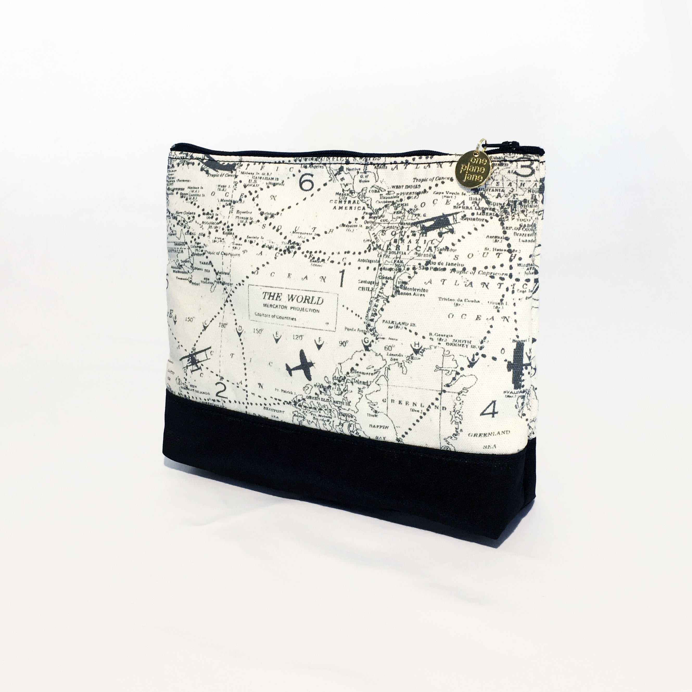 One Plane Jane Airplane Small Cosmetic bag pouch. Cream and black design featuring the world map with airplanes.  Zippered top and One Plane Jane zipper charm.