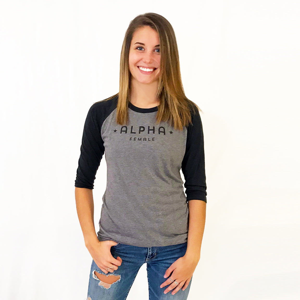One Plane Jane Alpha Female Baseball Tee shown in grey/ black with black letters . Super soft tri-blend.. Inspired by pilots, aviators but perfect for all strong independent women.