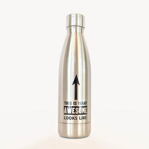 Silver / aluminum waterbottle with lid. Words "This Is What Awesome Looks Like" with an up arrow printed in white on front.